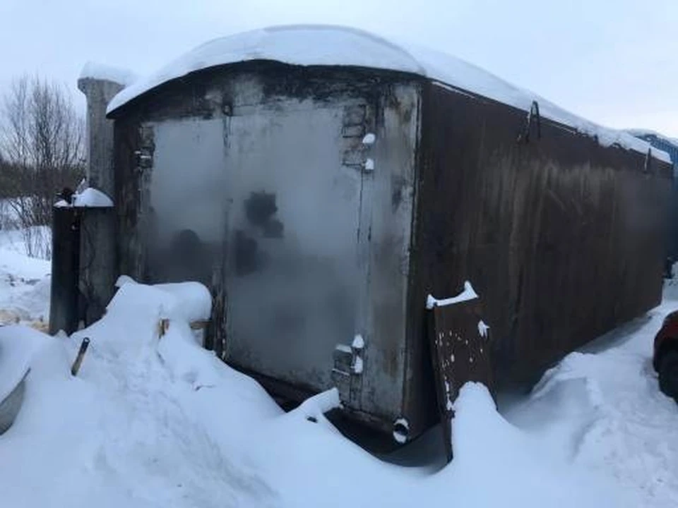 Погрузочный кран и трал понадобились стрежевчанину, чтобы забрать себе чужой гараж.