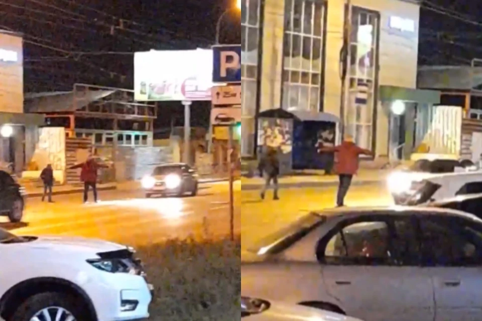 В Новосибирске заметили двух пьяных парней, идущих по проезжей части. Фото: стоп-кадры / АСТ-54.
