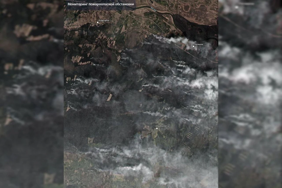 На кадре видно, как дым от возгораний окутал несколько крупных районов региона. Фото: пресс-служба «Роскосмоса»