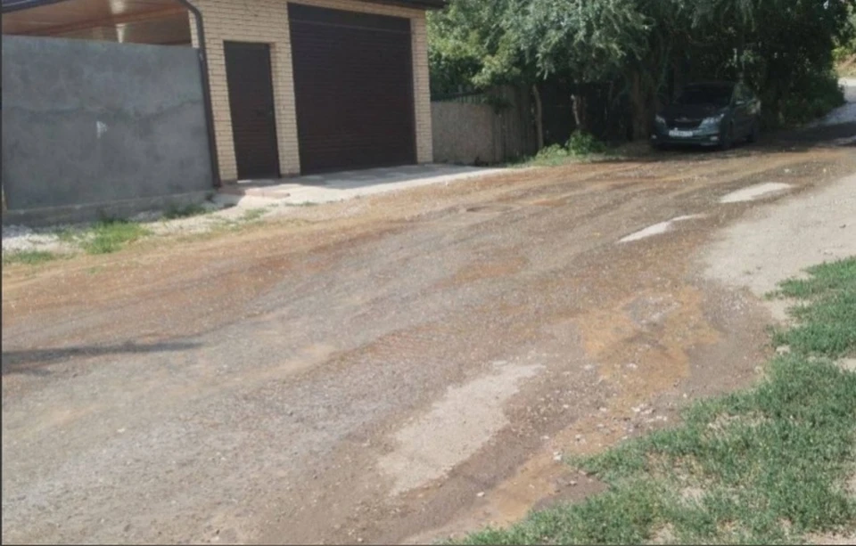 Вода стекает вниз по улице. Фото: "Самара с огоньком"