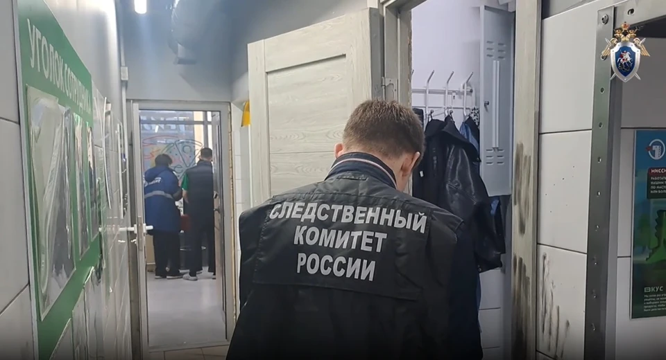 Следователи работают на месте преступления.
